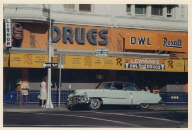 A vintage photo of downtown Napa Rexall drugstore and car from the Napa County Historical Society.